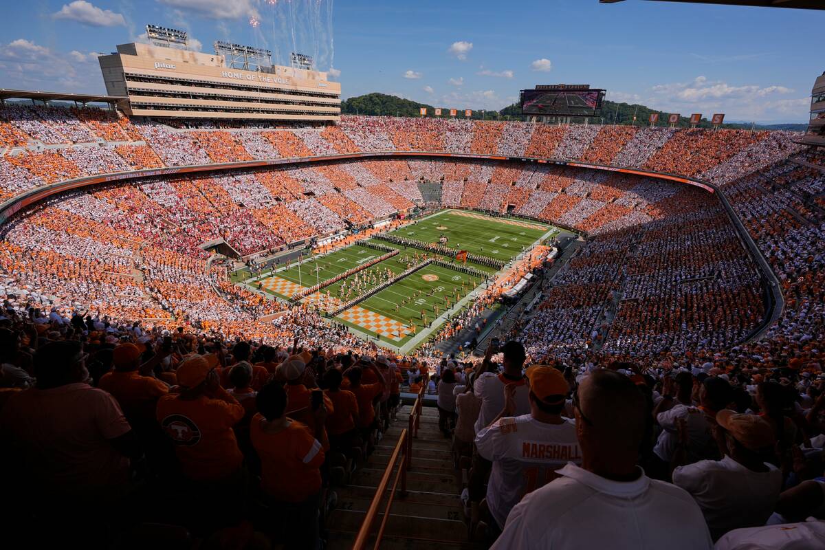 FILE - Tennessee runs onto the field before an NCAA college football game against Georgia, Sept ...