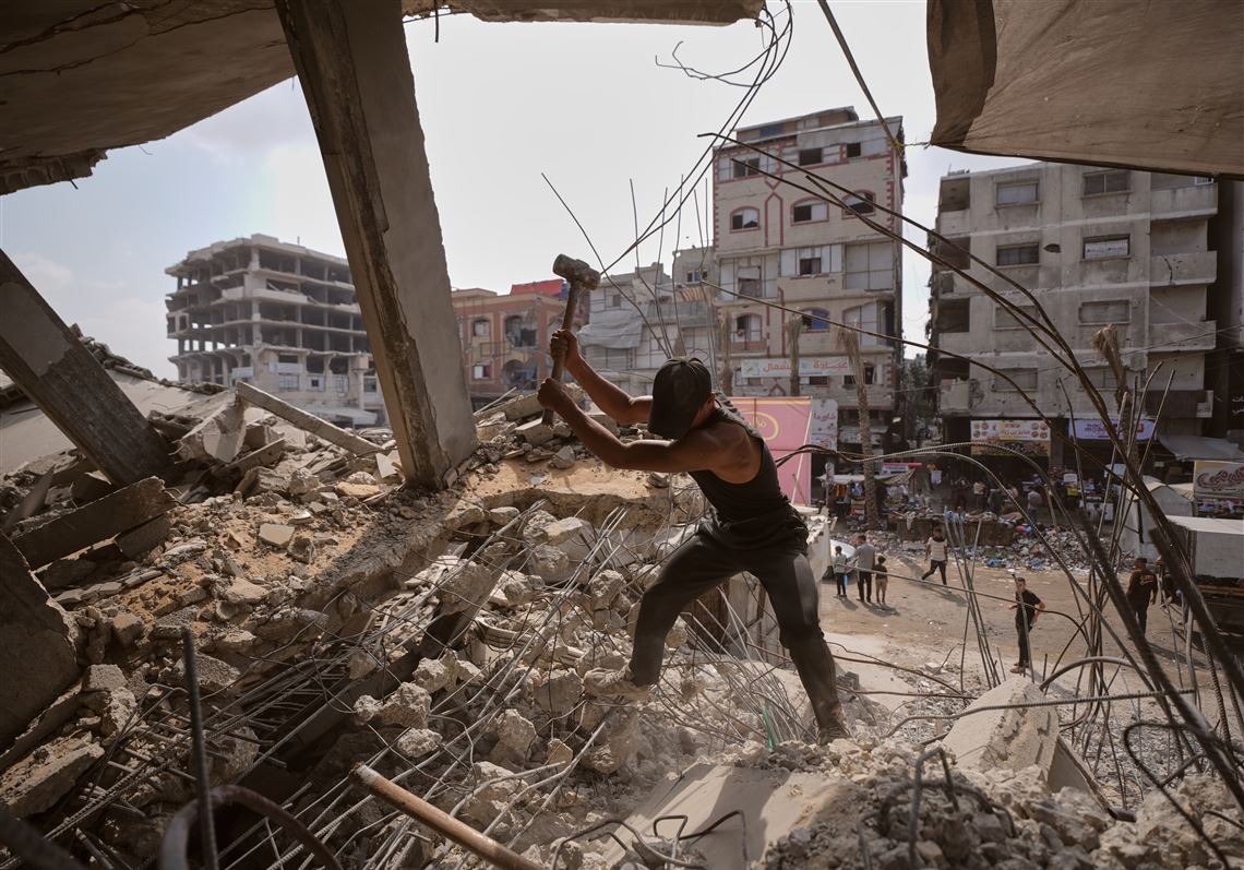 Top U.S. commander visits aircraft carrier, Gaza talks in Egypt and other Mideast news