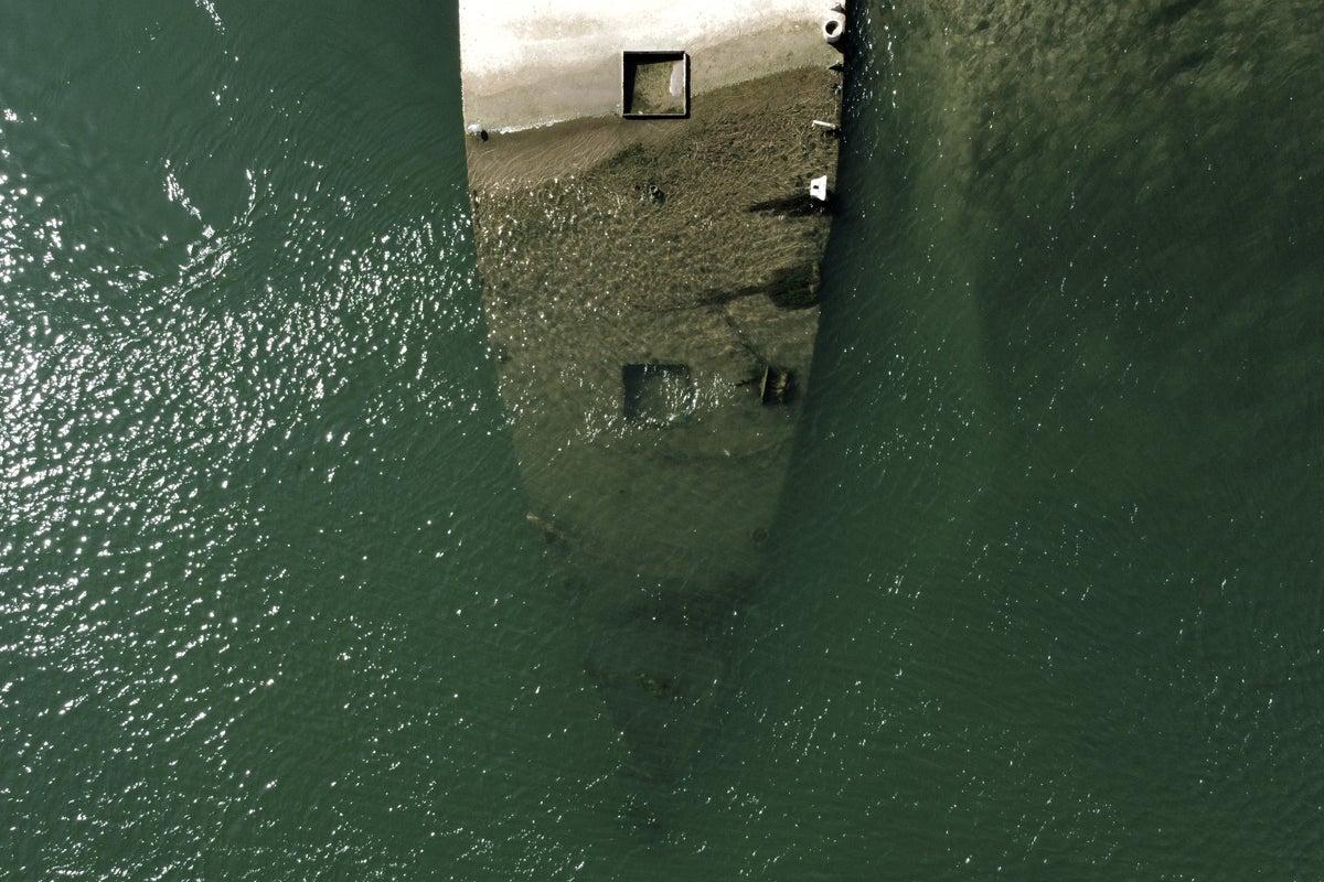 WWII tugboat ‘Slovenian’ rises from depths in Serbia as Danube River runs dry