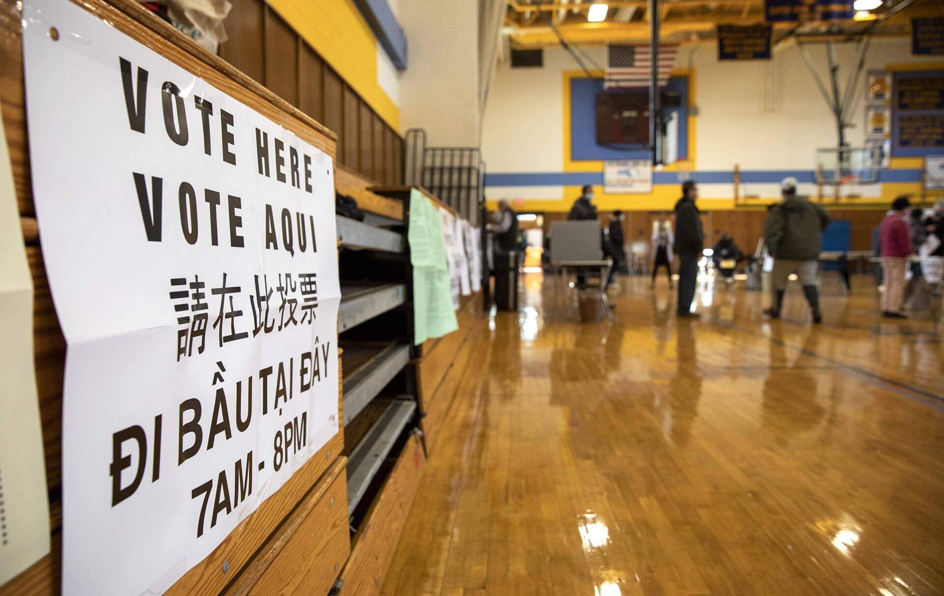 A voting sign at a polling station at East Boston High School. (Robin Lubbock/WBUR)