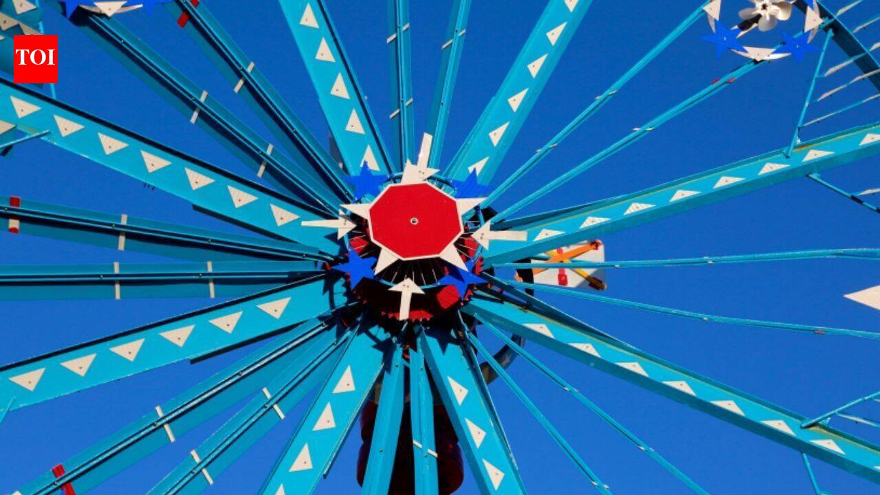 A retired North Carolina repairman built giant wind-powered sculptures from scrap; after 30 were moved downtown, the park drew 194,300 visitors and generated $5.3 million in regional sales