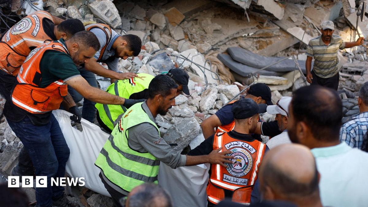 Gaza Civil Defence first responders attempt to rescue people trapped beneath the rubble of a war-damaged residential building that collapsed in Gaza City (16 September 2026)