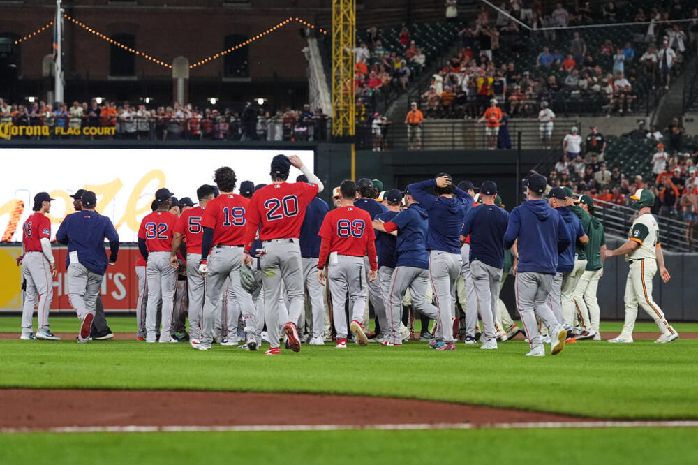 The benches clear during the eighth inning of a baseball game between the Baltimore Orioles and the Boston Red Sox, Friday, Sept. 4, 2026, in Baltimore. (AP Photo/Stephanie Scarbrough)