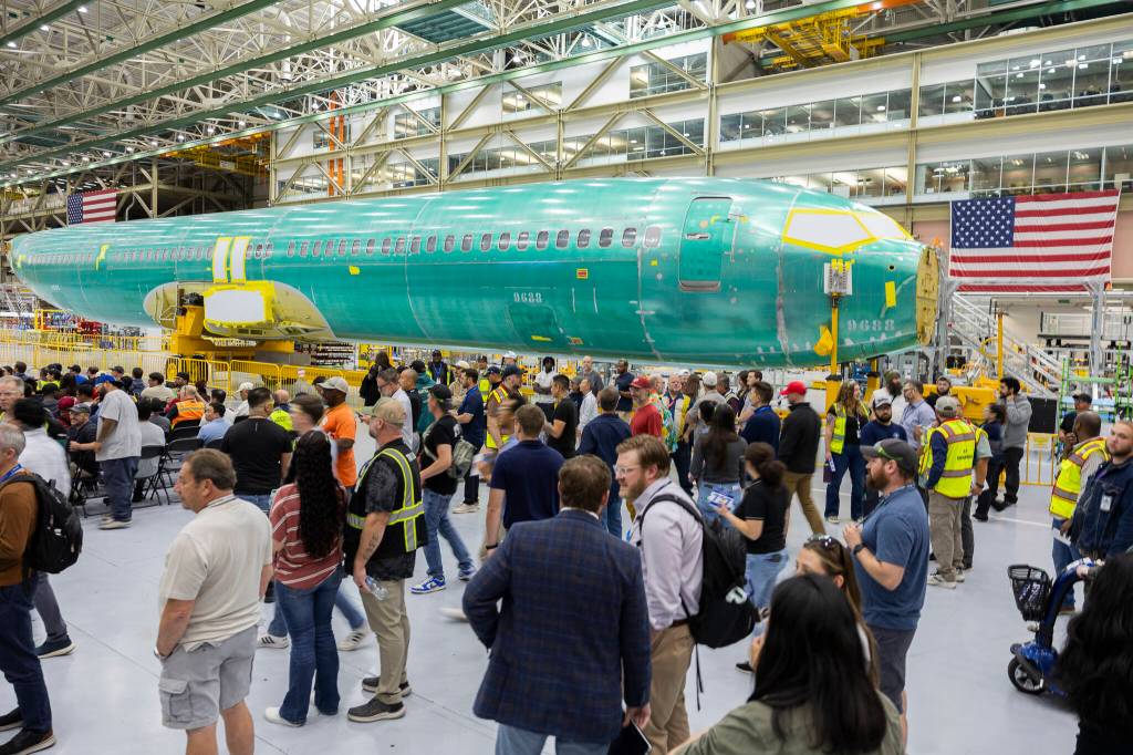 Hundreds gather for the North Line ribbon-cutting next to a fuselage of a 737 Max on Friday, July 10, 2026 in Everett, Washington. (Olivia Vanni / The Herald)
