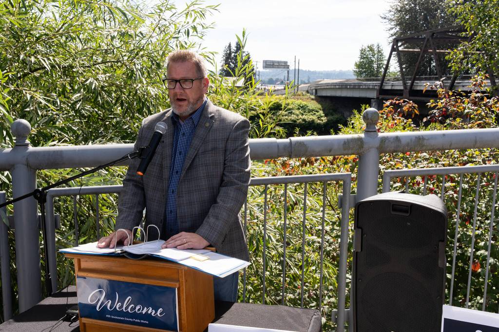 Snohomish County Council member Sam Low speaks at the press conference Wednesday in front of the Snohomish River Bridge in Snohomish. (Will Geschke / The Herald)