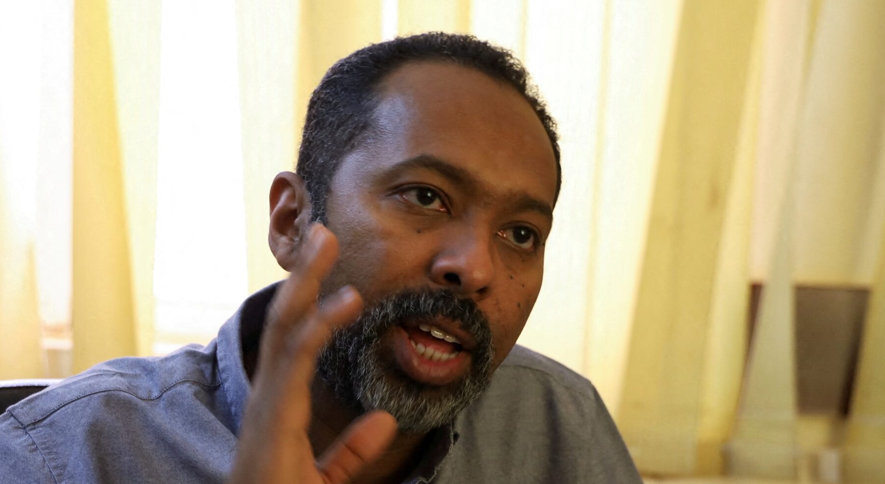Exiled opposition politician Khalid Omar attacks campaign promoting Burhan for president