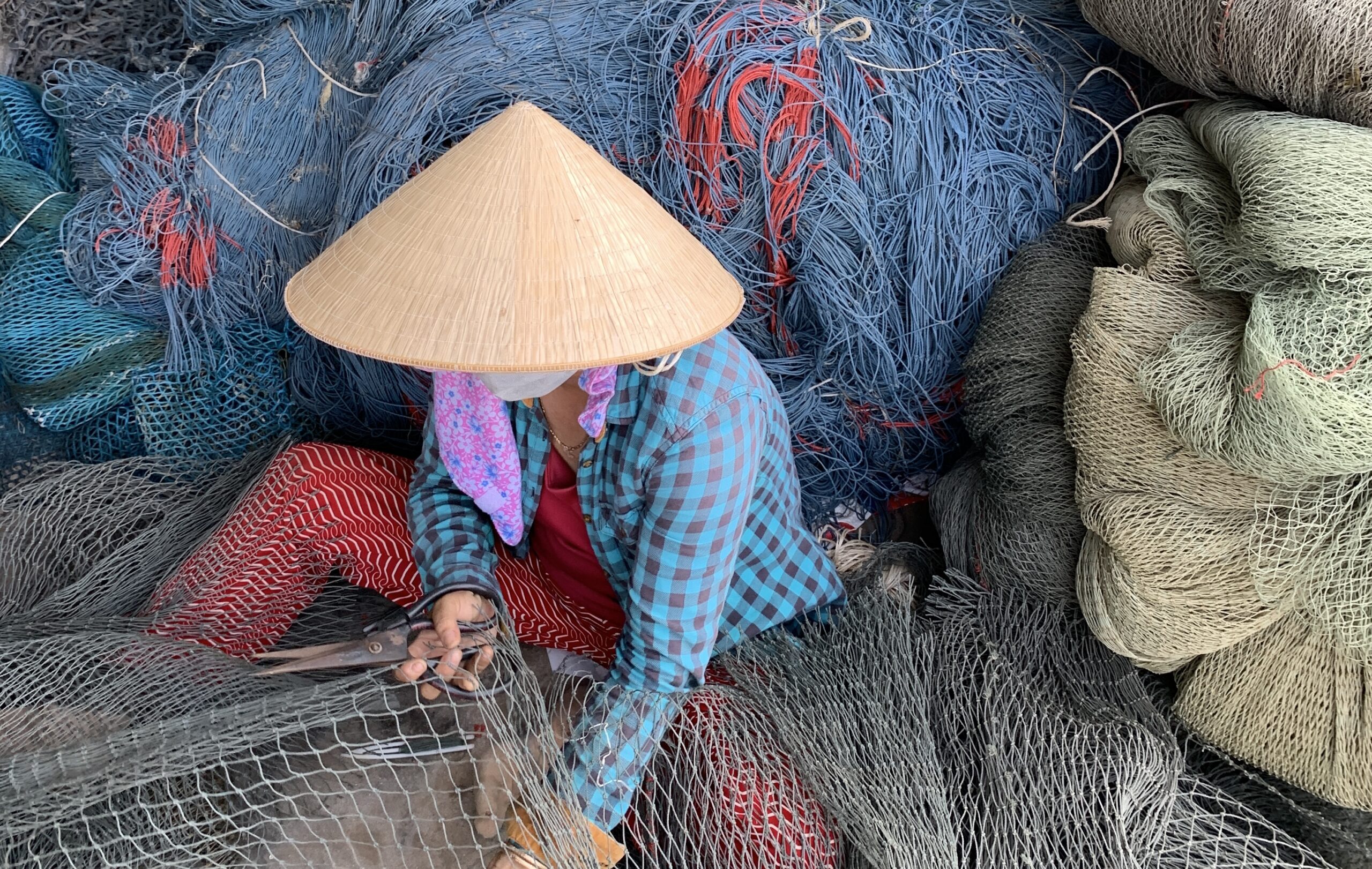 Fishers bear deep costs of plastic pollution in Vietnam, but could help turn the tide
