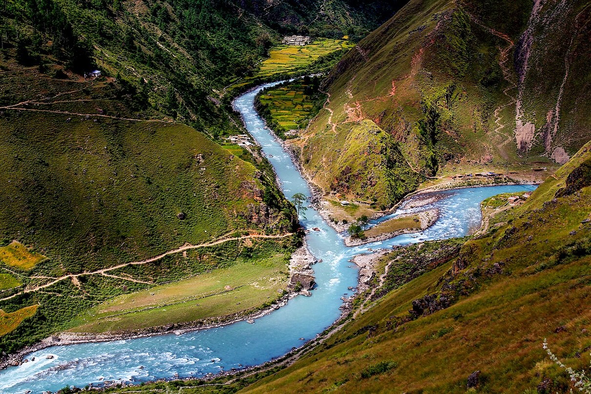 Confluence of the Chuwa River (at right) into the Karnali River (left). Image courtesy of Sherparinji via Wikimedia Commons / Creative Commons Attribution-Share Alike 3.0.