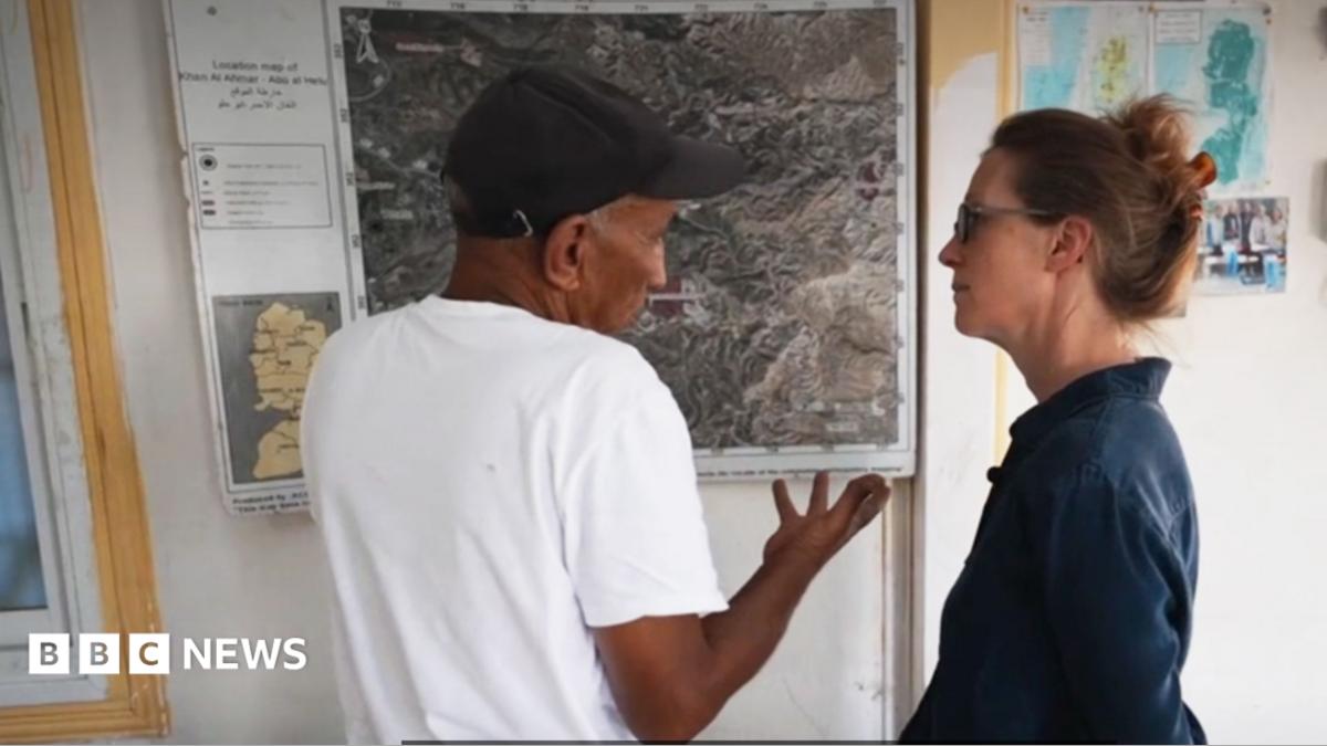 engrab or report showing Lucy Williamson speaking to Bedouin community leader Eid Khamis