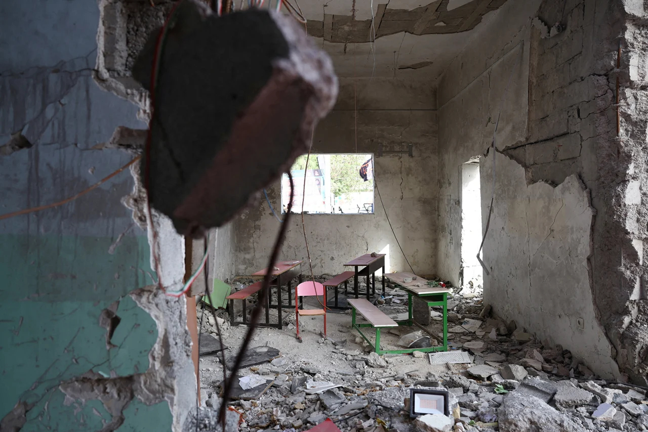 Iranian president will talk about a deadly school strike. Here's a reminder of what happened