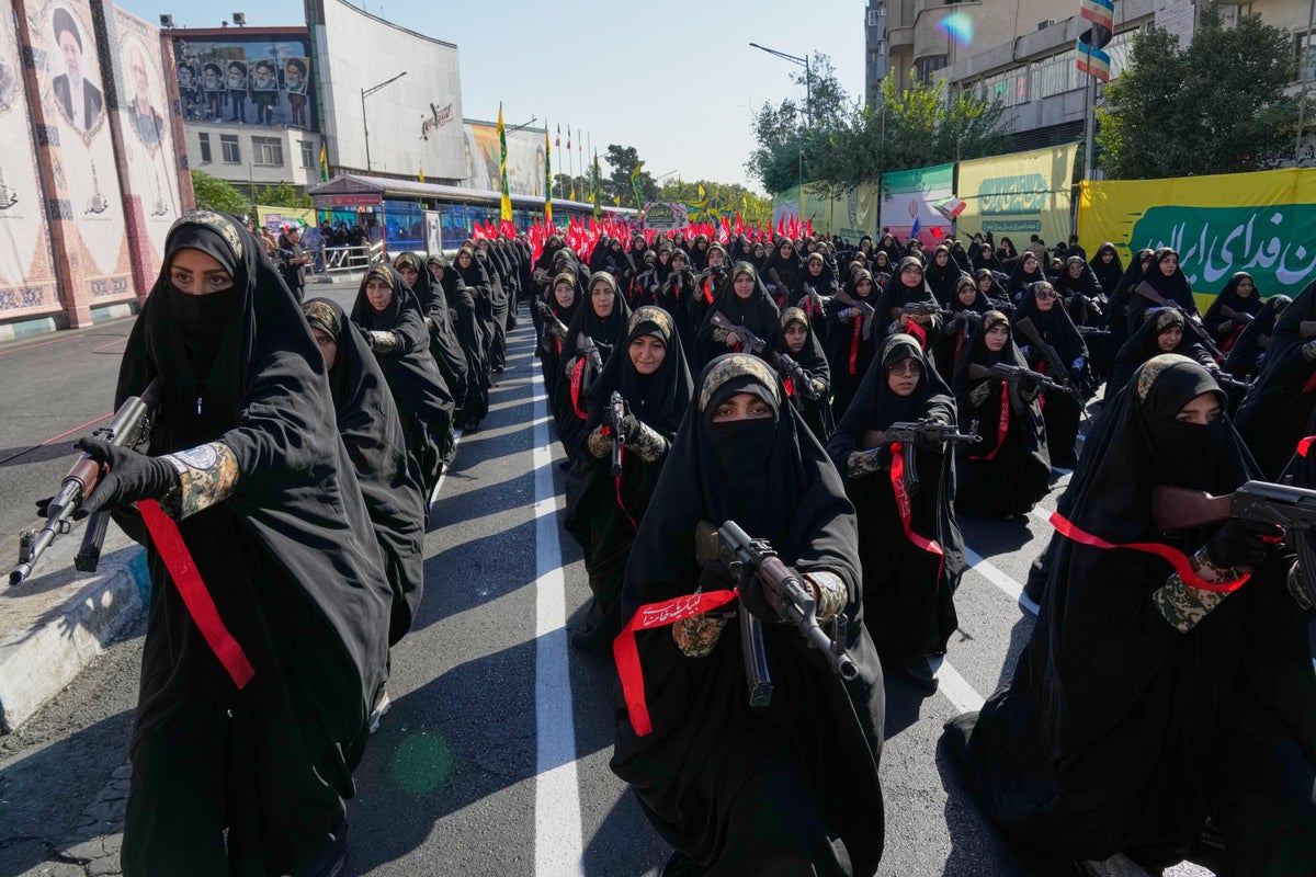 Iranians rally by the hundreds of thousands in biggest show of defiance since war began