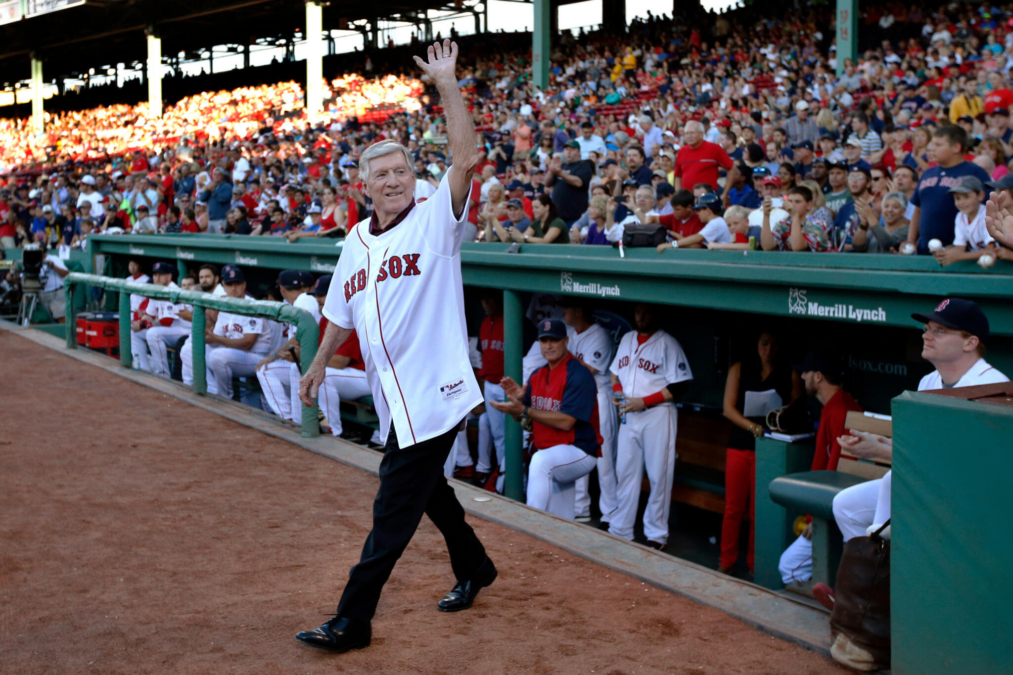 Former Boston Red Sox manager Joe Morgan waves to fans as he is honored prior to a baseball game between the Red Sox and the Seattle Mariners in Boston on July 30, 2013. (Elise Amendola/AP file)