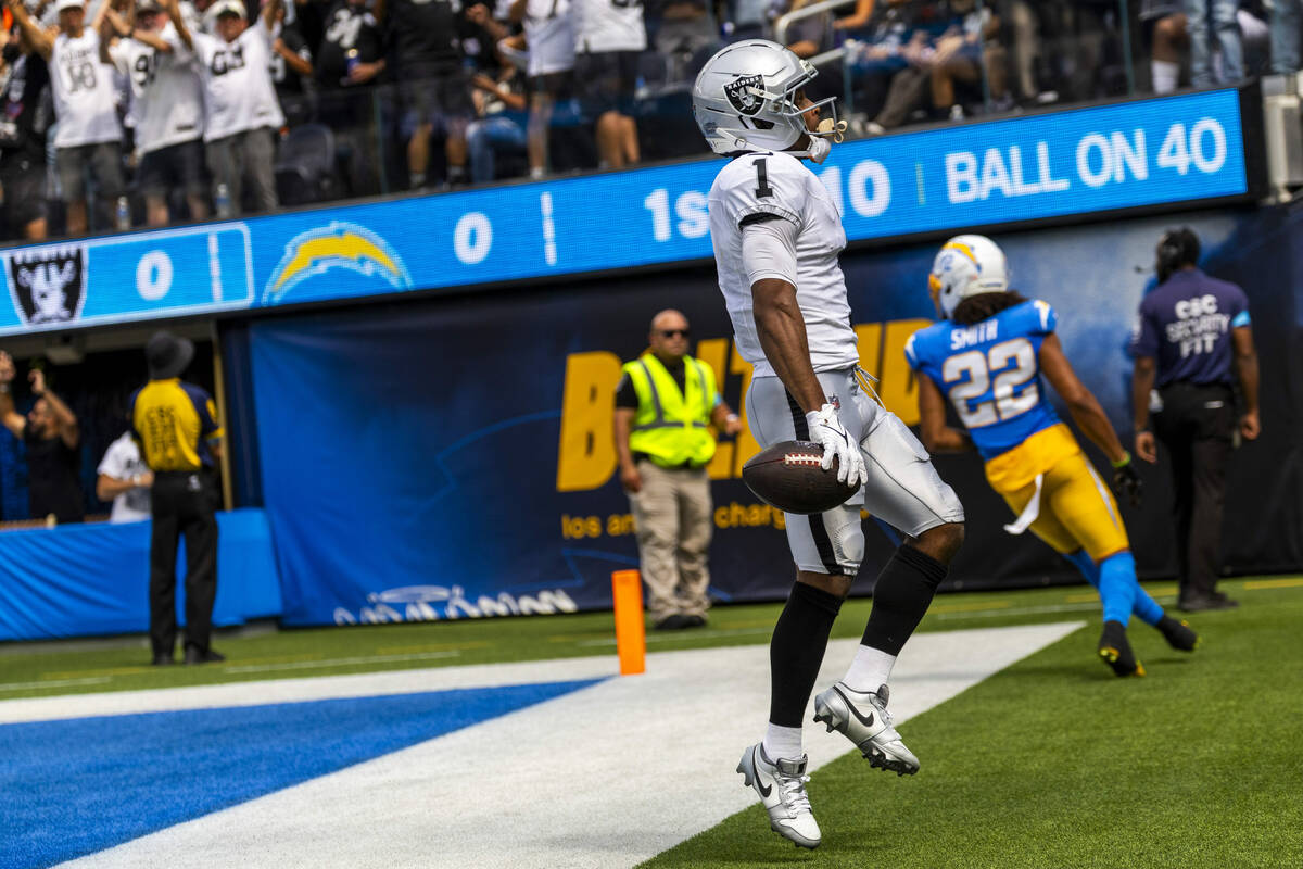 Raiders wide receiver Tre Tucker (1) celebrates a score against the Los Angeles Chargers during ...
