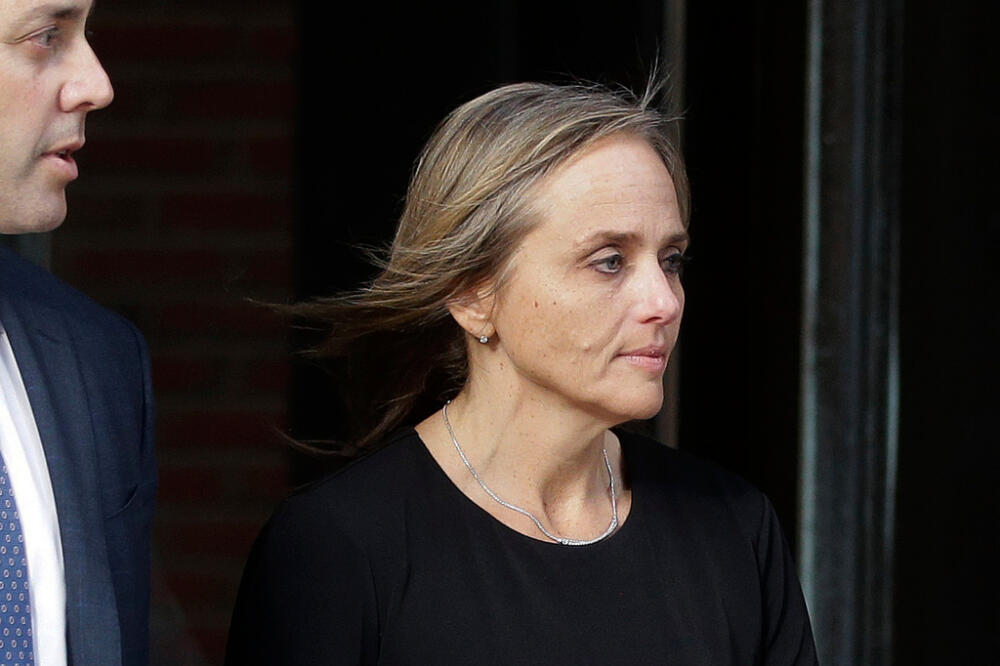 District Court Judge Shelley Joseph departs federal court, April 25, 2019, in Boston. (Steven Senne/AP, File)