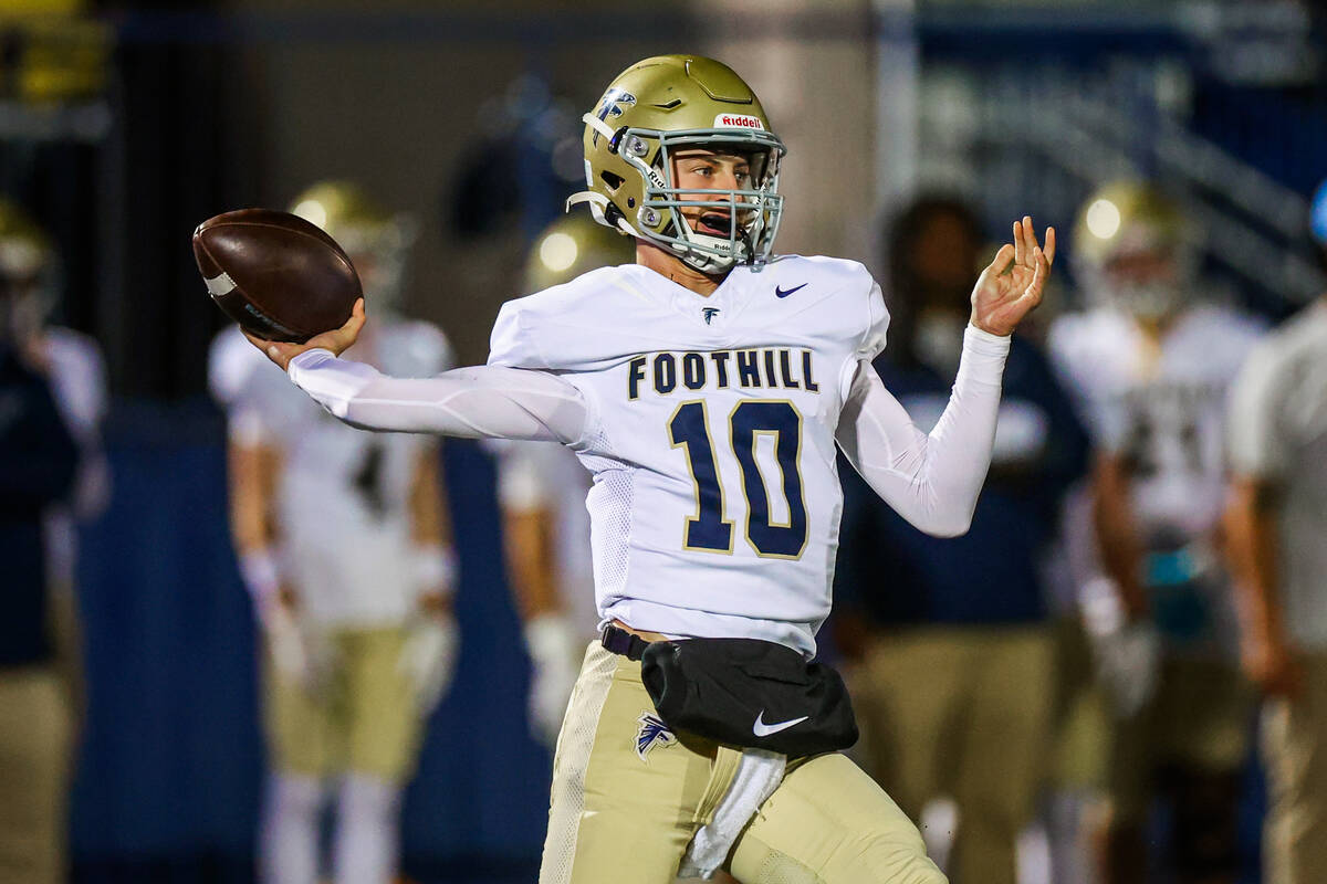 Foothill quarterback Ryder Dobbs throws the ball during a Open Division high school football pl ...