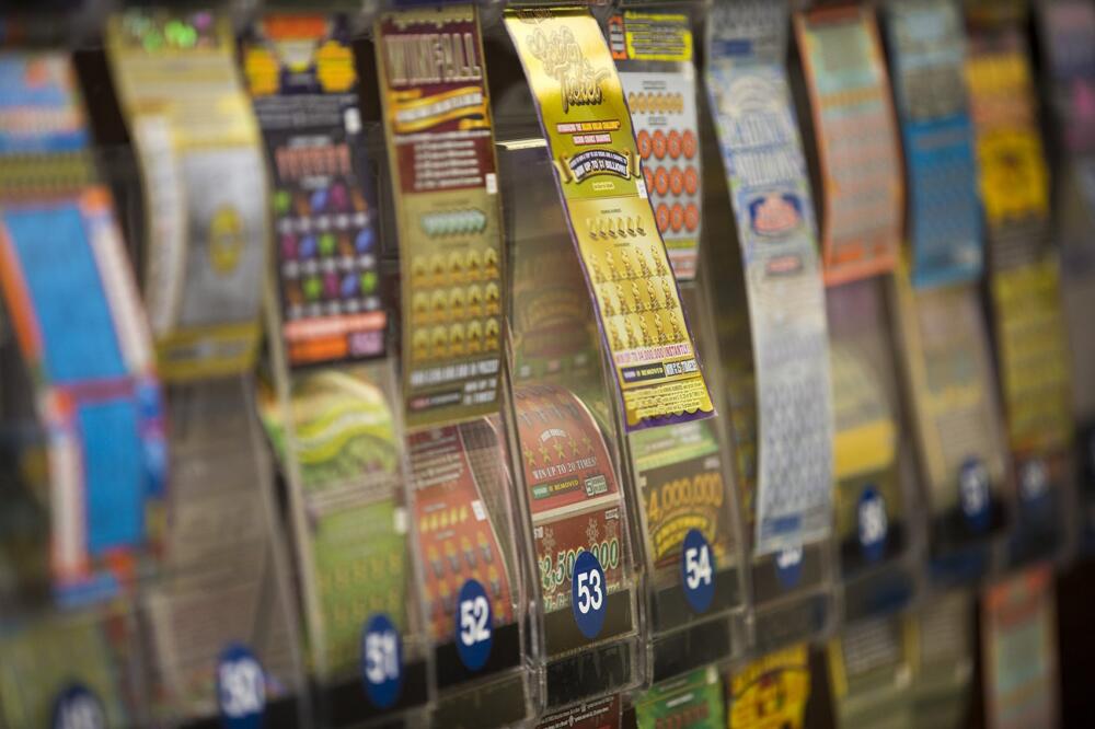 Lottery tickets at a convenience store in Boston. With the launch of Massachusetts Lottery Online, a form of scratch ticket as well as other games are available digitally. (Jesse Costa/WBUR file)