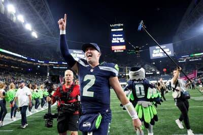 Drew Lock #2 of the Seattle Seahawks celebrates after defeating the New England Patriots in the game at Lumen Field on September 09, 2026 in Seattle, Washington. (Steph Chambers / Getty Images / The Athletic)