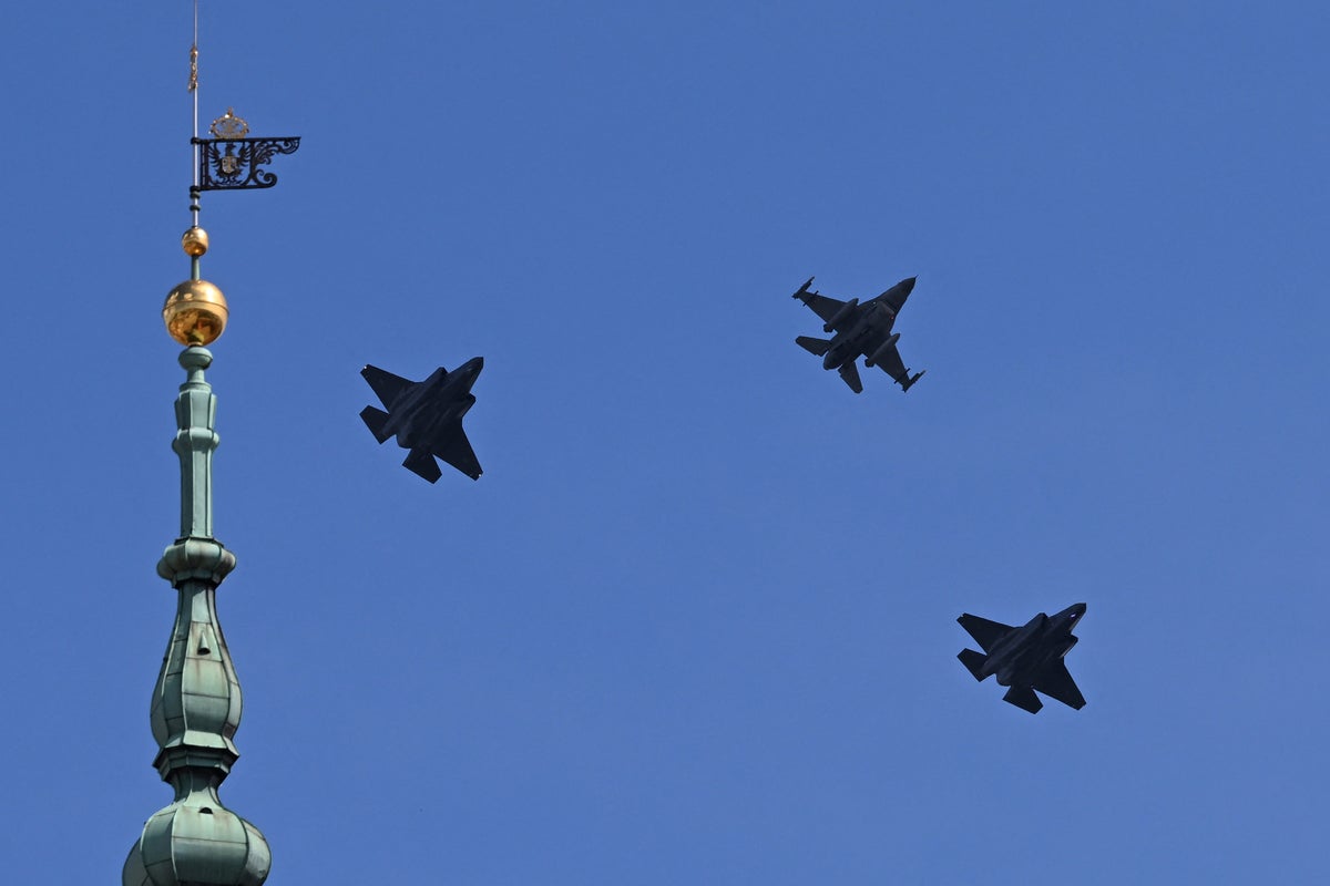 Ukraine-Russia war live: Explosions near Polish border after two airports forced to shut during daytime attacks