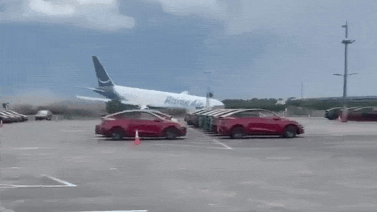 Video captures moment Amazon cargo plane hurtles off runway, erupts in flames