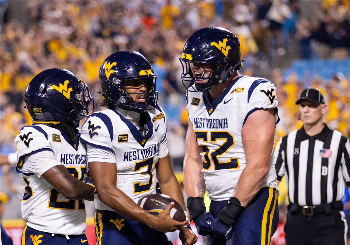 West Virginia beats No. 25 Virginia 38-27 in the Duke’s Mayo Classic