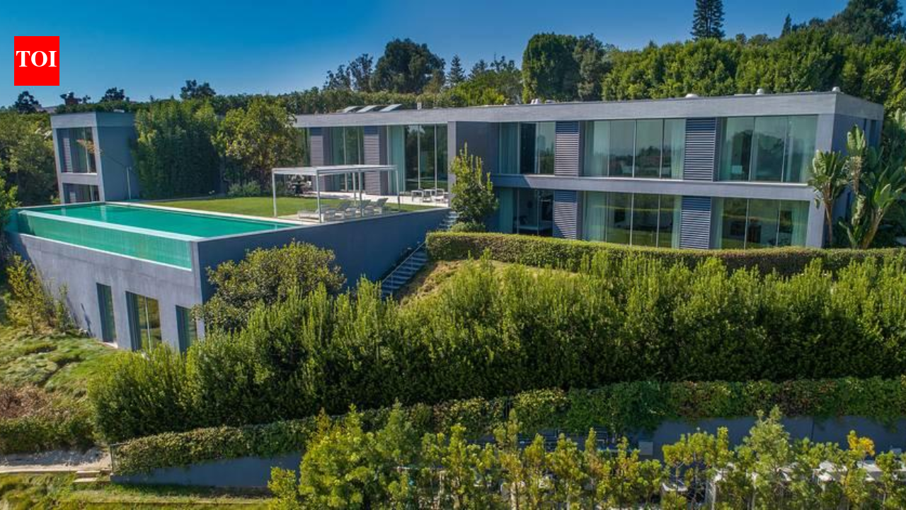 A developer bought a 0.59-acre Bel Air lot for $3.25 million in 2017 and spent nine years building a 10,950 sq ft brutalist mansion from 4,500 tons of reinforced concrete; it is now listed for $36.5 million
