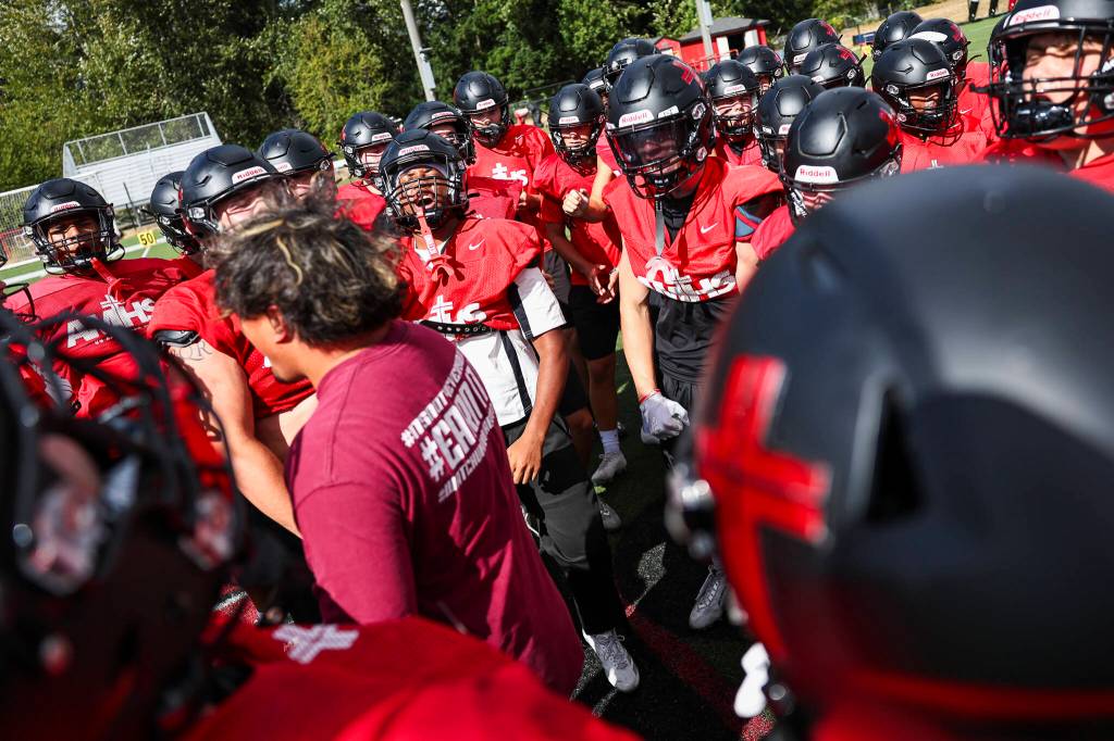 Archbishop Murphy High School football players gather for a cheer during practice on Thursday, Aug. 27, 2026 in Everett, Washington. (Olivia Vanni / The Herald)