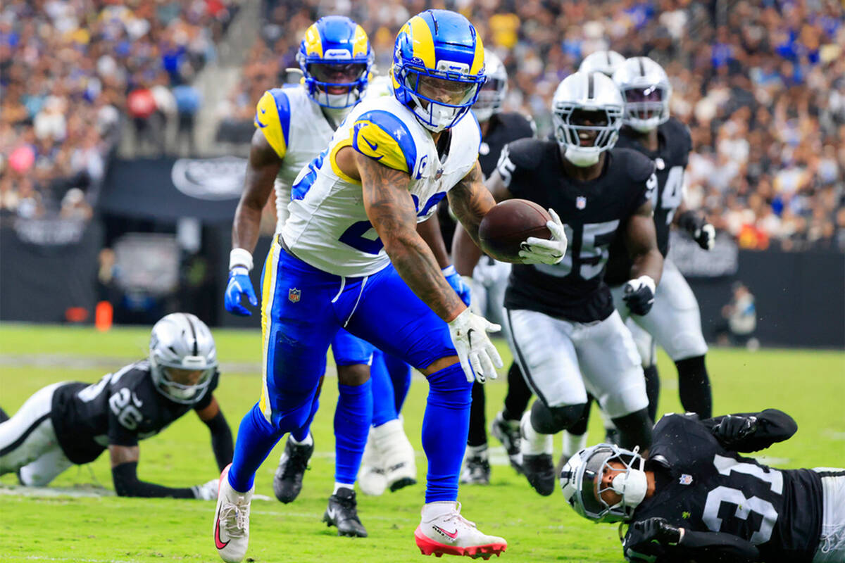 Los Angeles Rams running back Kyren Williams (23) runs for a touchdown as Raiders cornerback Da ...