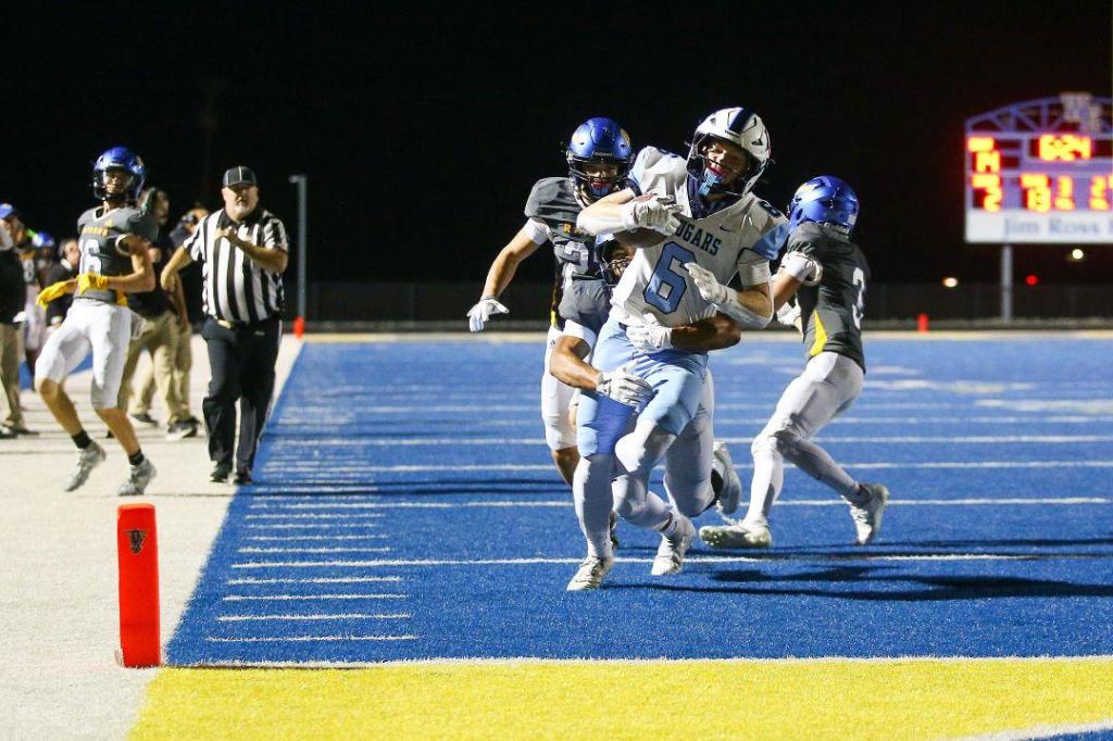Cougars outslug Raiders for 43-21 win