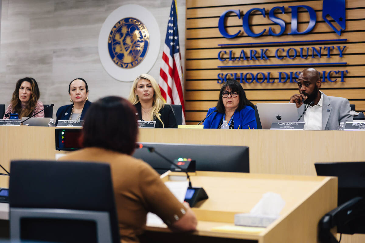 CCSD school board members listen to public comments during a school board meeting at the Edward ...