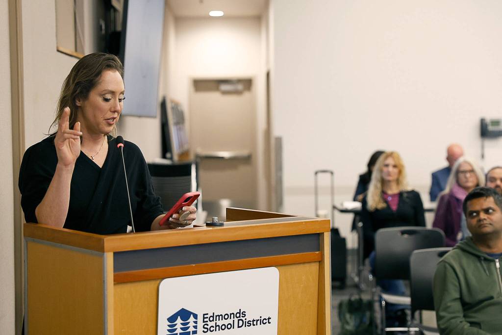 Parent Emily Oliver speaks during the public comment portion of the Edmonds school board meeting Tuesday, Oct. 14, 2026, in Lynnwood, Washington. (Mike Henneke / The Herald)