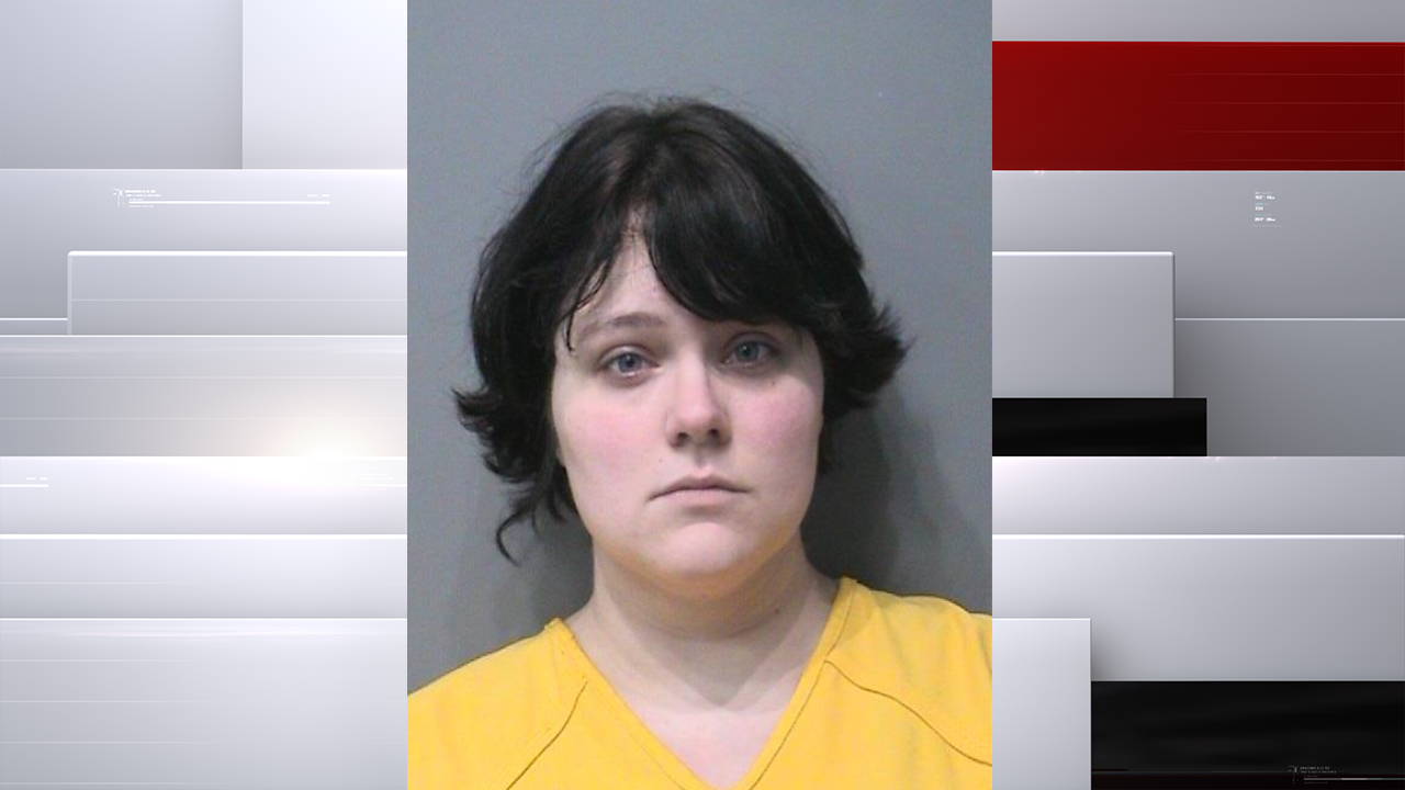 Greenwood mother arrested after child found alone in diaper near creek