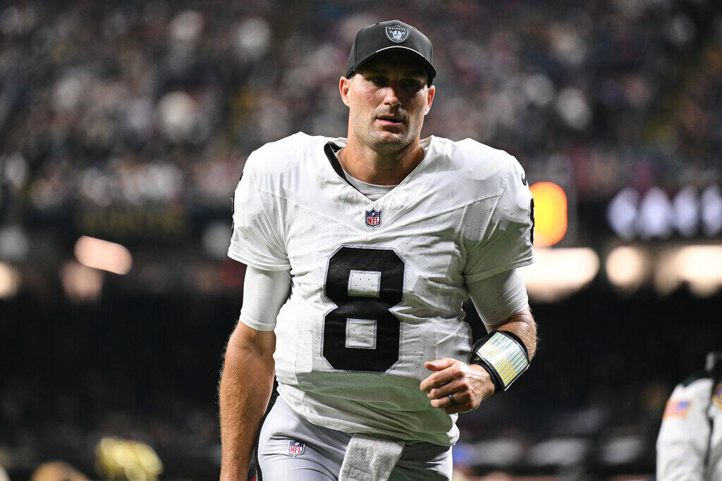 Las Vegas Raiders' Kirk Cousins (8) jogs off the field during halftime of an NFL football ...