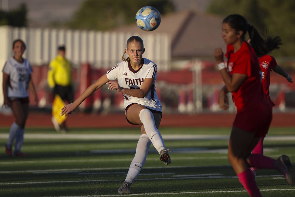 Faith Lutheran's Gloria Vancura (20) takes a shot on the goal during a soccer game at Arbo ...