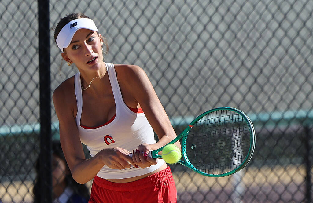Coronado’s Kamilah Saine returns a ball during the girls 5A doubles state championship ...