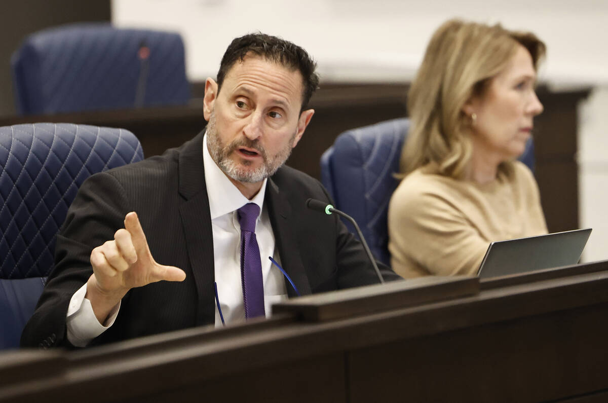 Las Vegas Review-Journal Chief Legal Officer Ben Lipman, left, and Colleen McCarty, a commercia ...