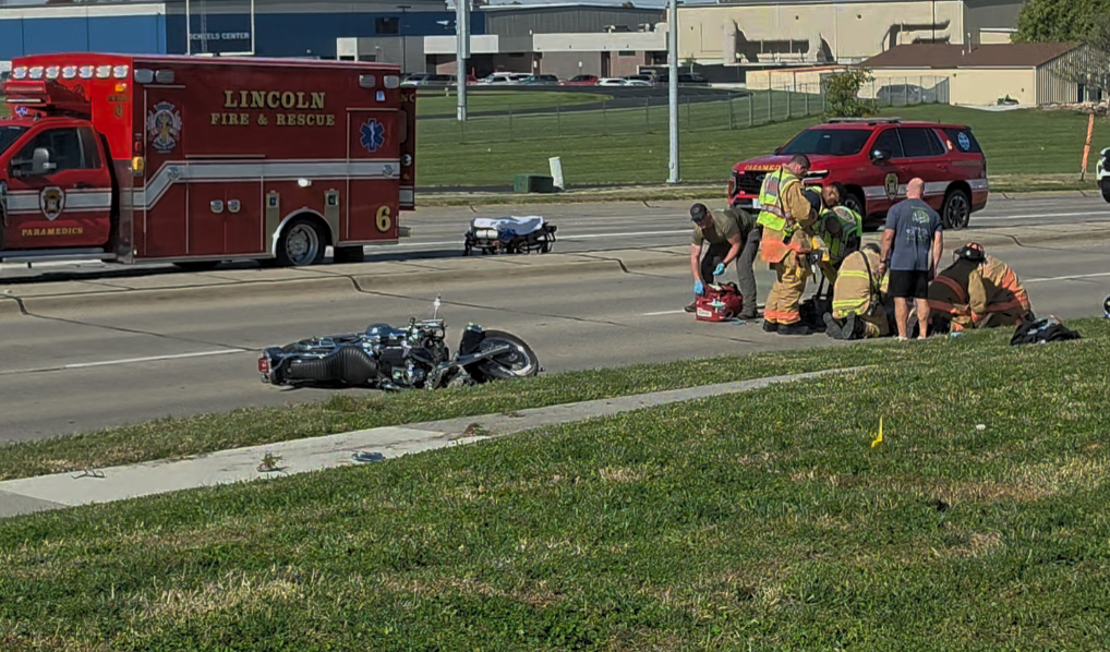 One person in critical condition after motorcycle and vehicle crash