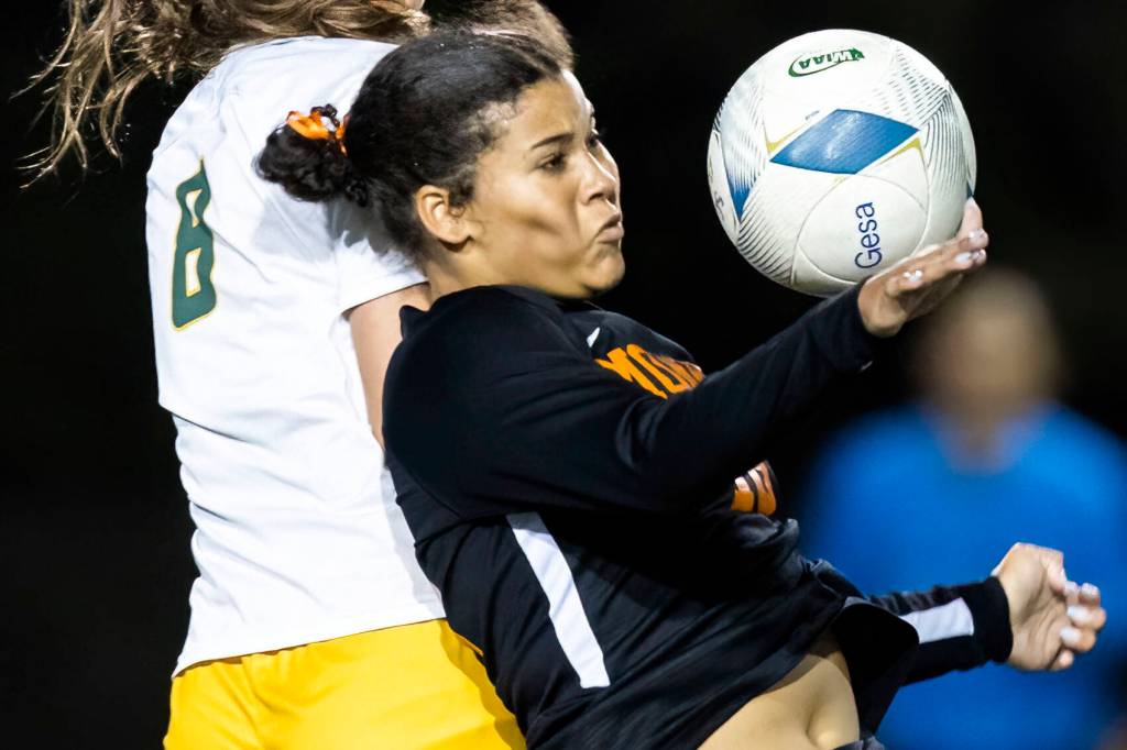 Monroe’s Addison Williams traps the ball with her chest during the 3A district game against Shorecrest on Thursday, Nov. 7, 2024 in Shoreline, Washington. (Olivia Vanni / The Herald)