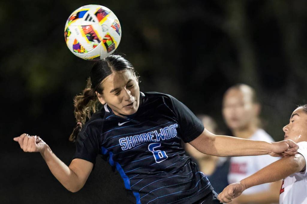 Shorewood’s McKenna Anderson heads the ball during the 3A district game against Mountlake Terrace on Oct. 30, 2025 in Shoreline, Washington. (Olivia Vanni / The Herald)
