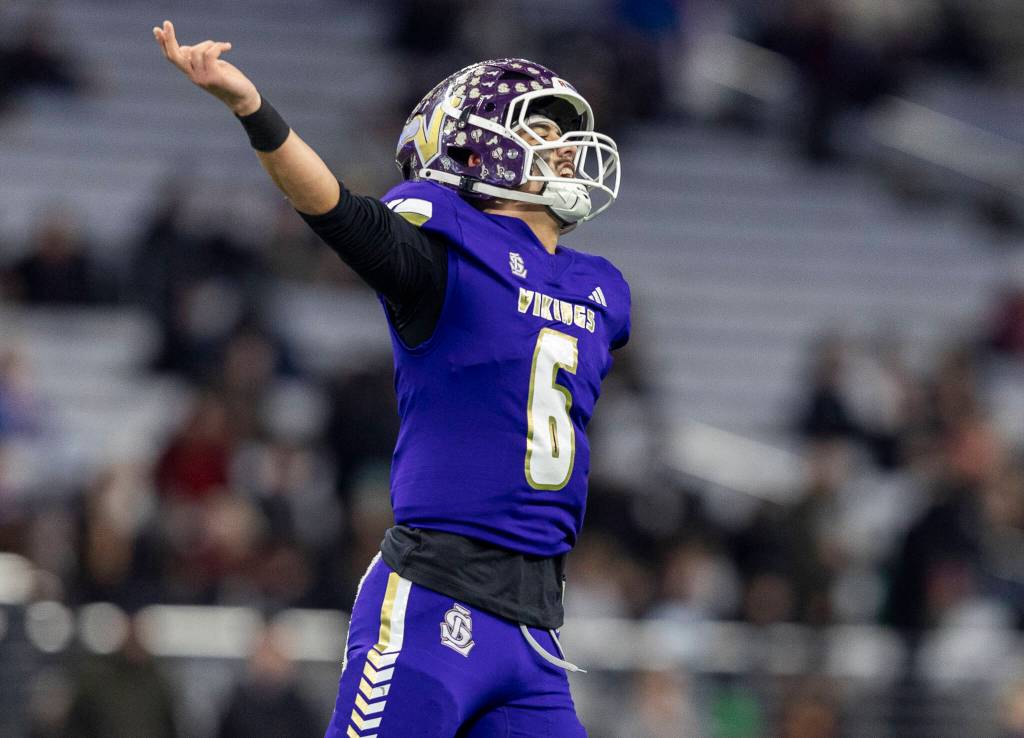 Lake Stevens’ Blake Moser yells after a touchdown during the 4A state championship game against Sumner at Husky Stadium on Saturday, Dec. 6, 2025 in Seattle, Washington. (Olivia Vanni / The Herald)