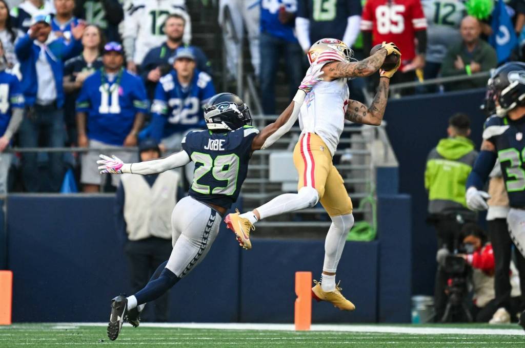 San Francisco 49ers wide receiver Mike Evans makes a catch over Seattle Seahawks cornerback Josh Jobe during a game on Sunday, Oct. 11, 2026 at Lumen Field in Seattle. (Photo courtesy of Seattle Seahawks)