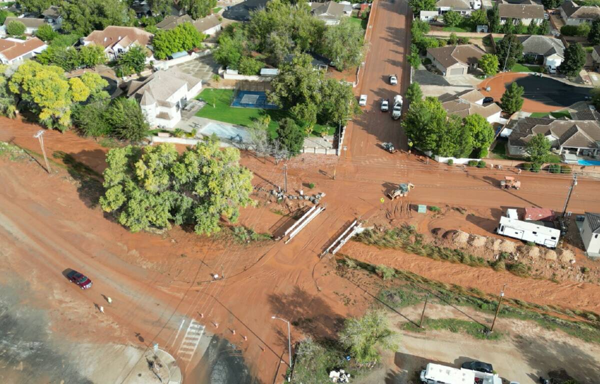 This image taken from video shows flooding in the Gould Wash drainage watercourse in Hurricane, ...