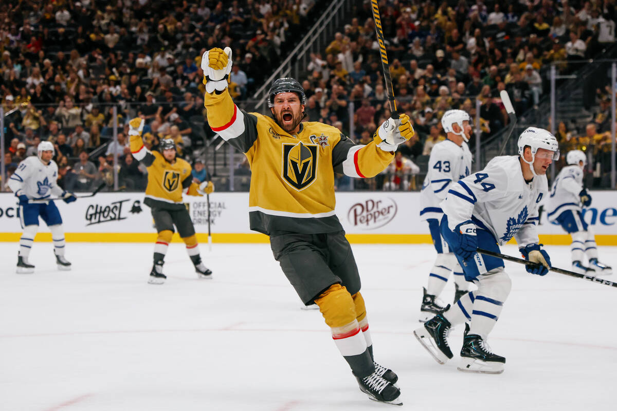 Golden Knights right wing Mark Stone (61) celebrates his goal during the first period of the ga ...
