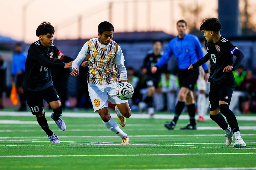 Eldorado Firehawks junior Josue Figueroa (9) gains possession of the ball and looks to advance ...